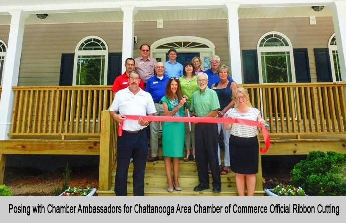 Posing with Chamber Ambassadors for Chattanooga Area Chamber of Commerce Official ribbon cutting.